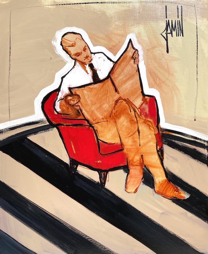 Lecteur au fauteuil rouge